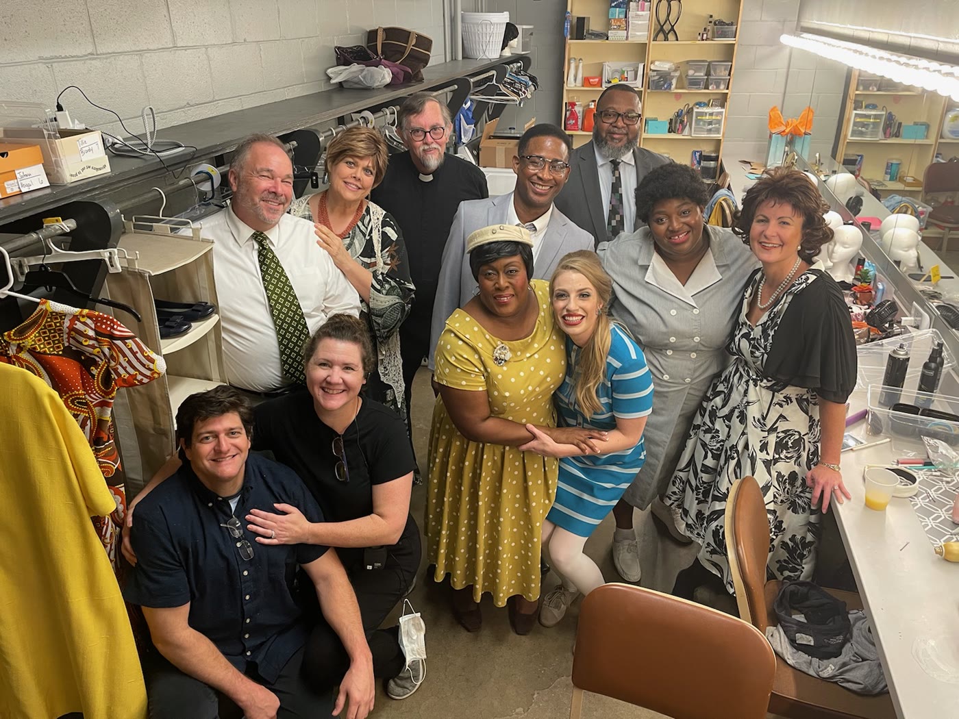 Grace H Bryan with a theater cast backstage
