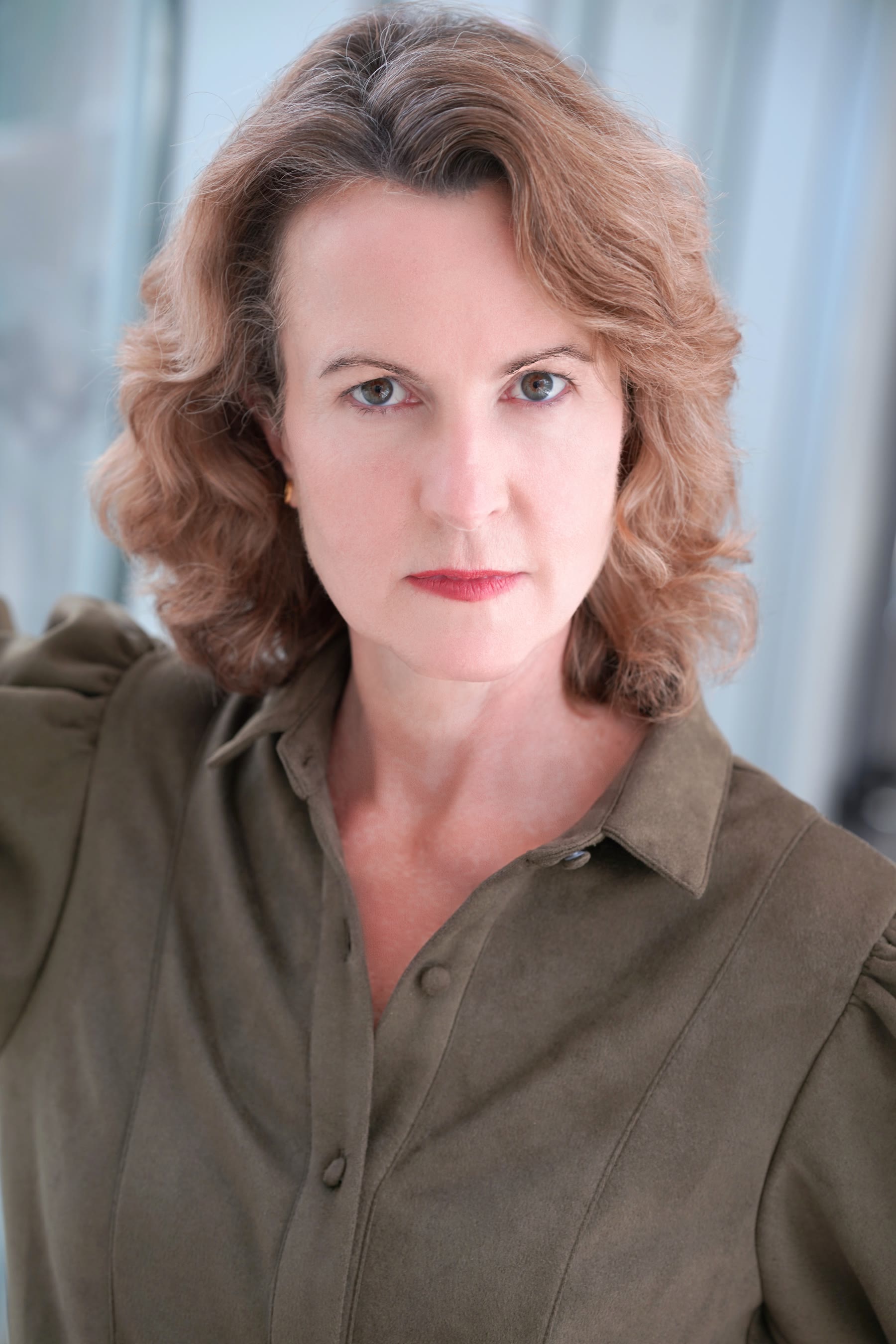 Grace H Bryan dramatic headshot