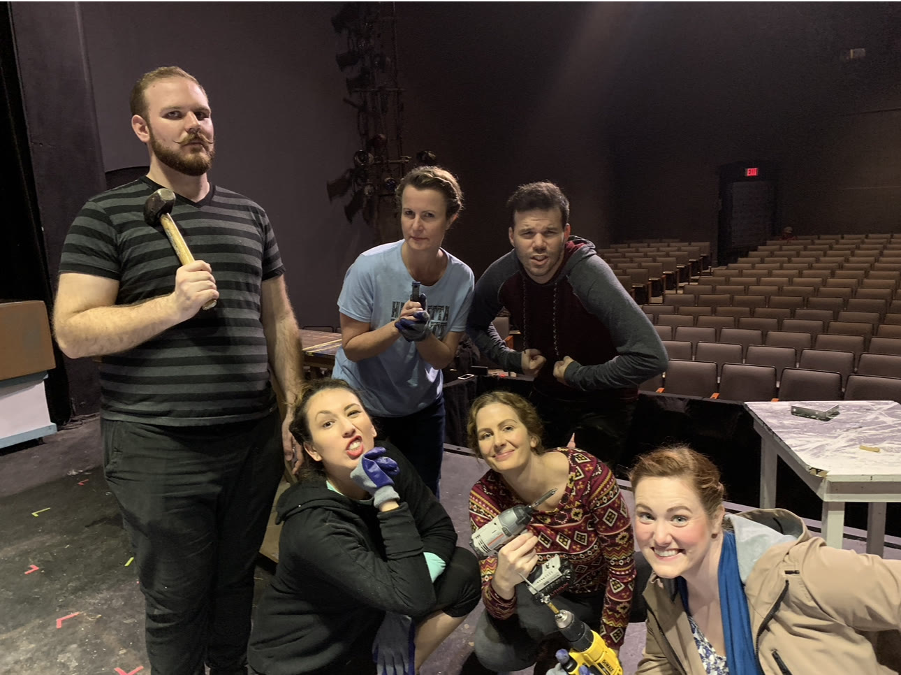 Grace H Bryan with a stage crew